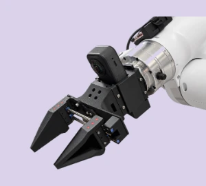 Parallel-jaw gripper and camera module on a robot flange